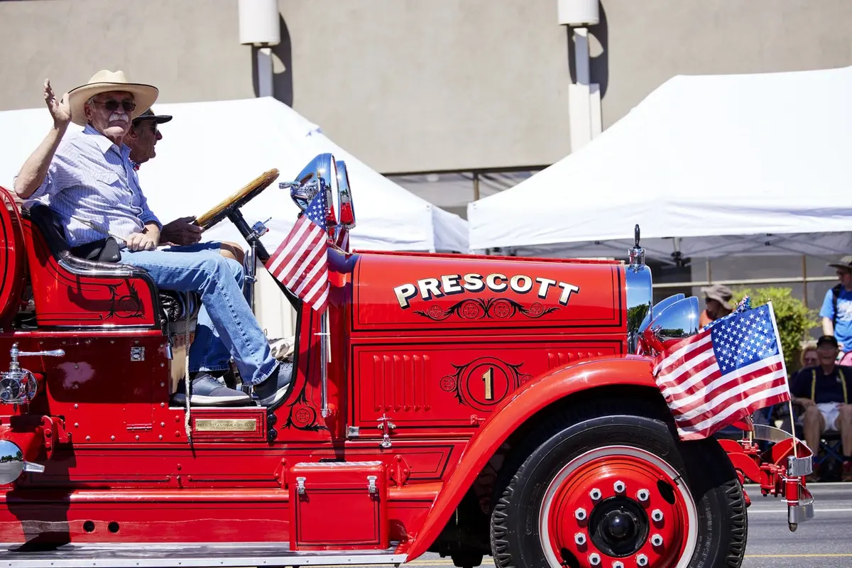 Antique fire truck in a Prescott parade representing best places to retire in Arizona and Prescott community life