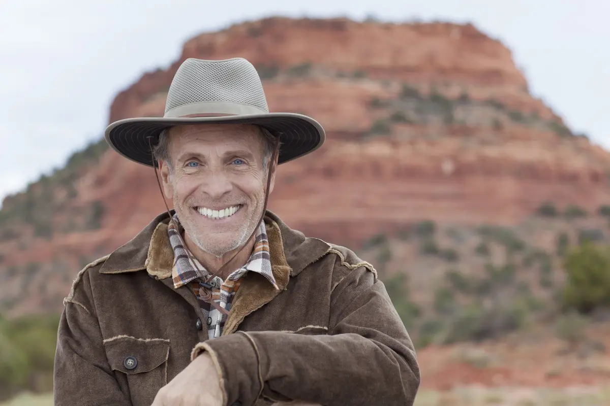 Senior man hiking outdoors, reflecting cost of living in Prescott AZ for retirees and the lifestyle that draws people to Prescott